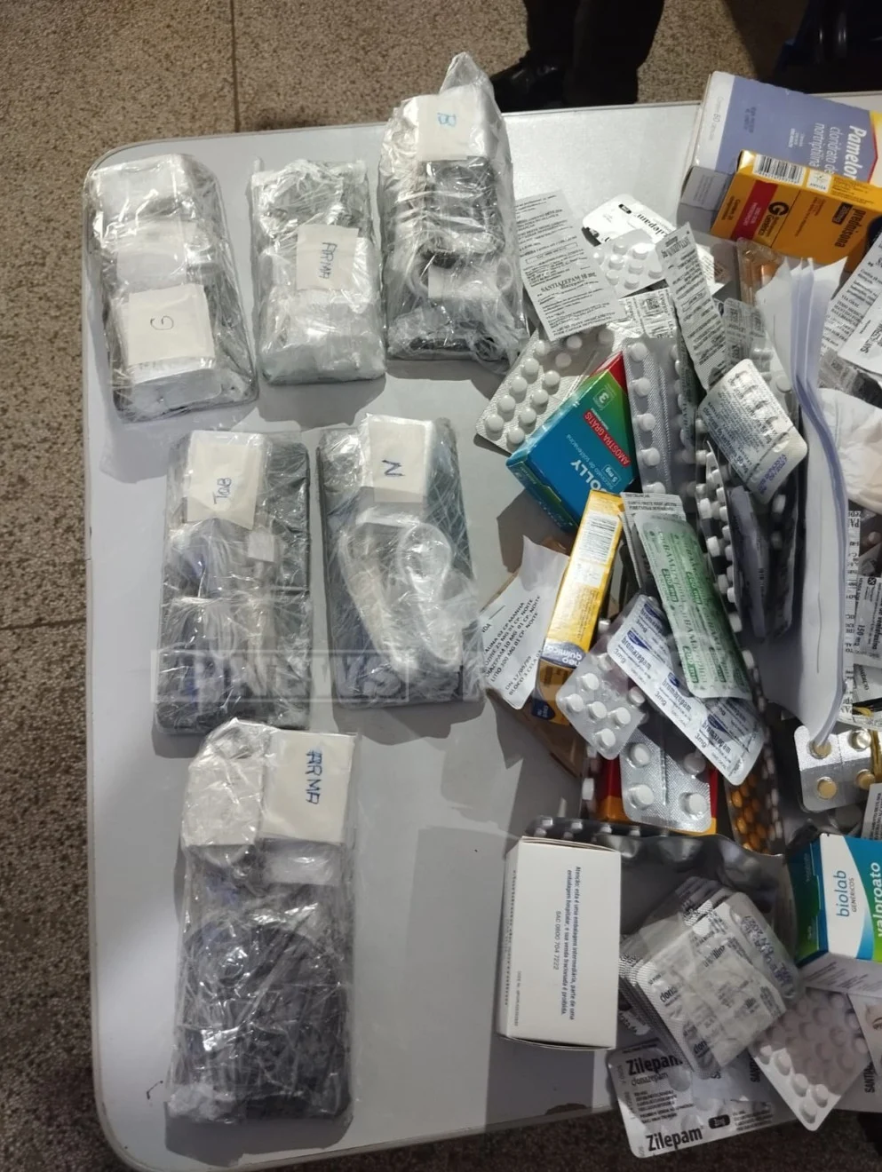 Farmacêutico disse que entregaria os celulares para preso a pedido do filho: